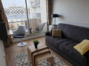 Studio calme avec vue toits de Paris et Tour Eiffel